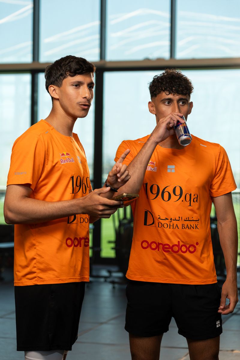 The brothers in the gym in orange kit