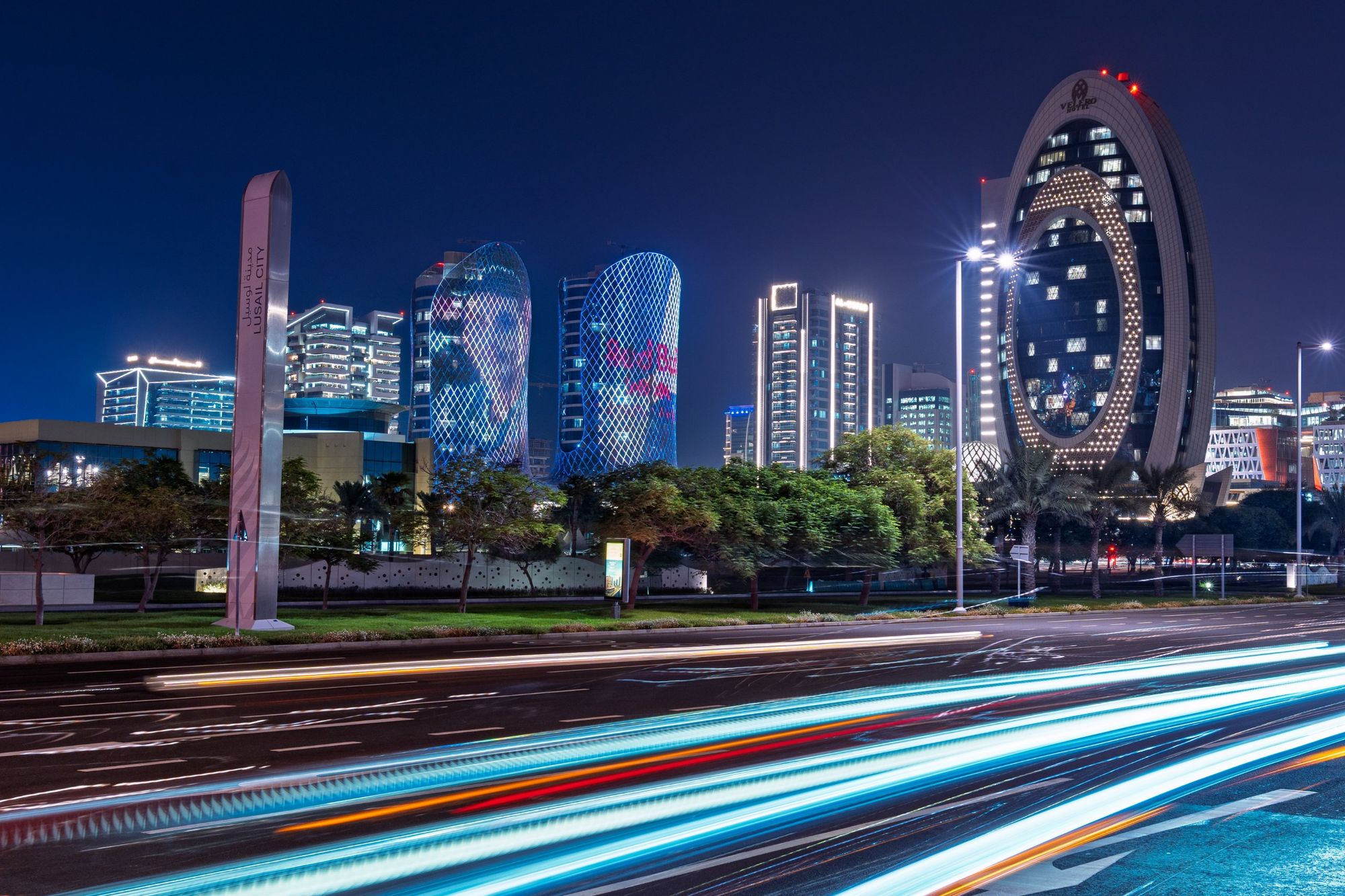 Graded night photo of Lusail with light trails